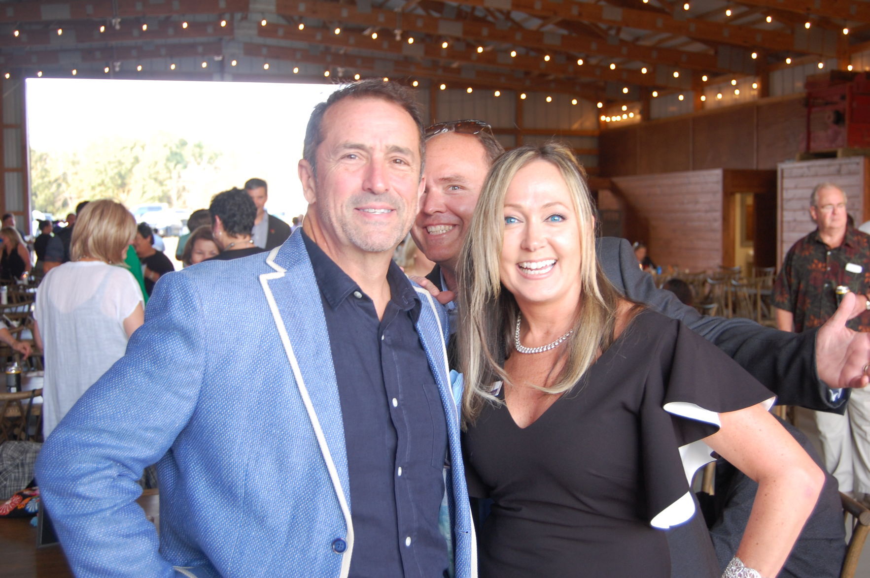 Dan Adams, Cheryl Magnuson with photobomber Charlie Moore